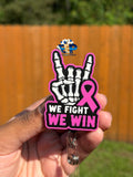 Pink and black breast cancer awareness badge reel with skeleton hand, pink ribbon, and We Fight We Win lettering
